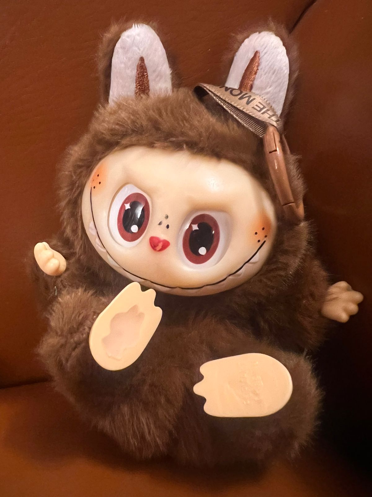 картинка Модная игрушка-брелок, коричневая от магазина El Corazon