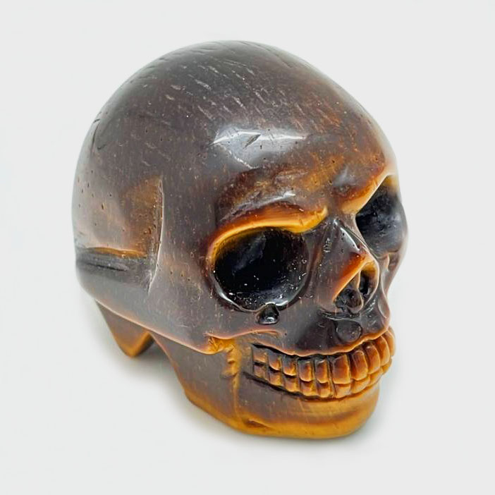 картинка Череп - символ выдержки и спокойной внутренней силы из тигрового глаза Sr-Skull-10 от магазина El Corazon