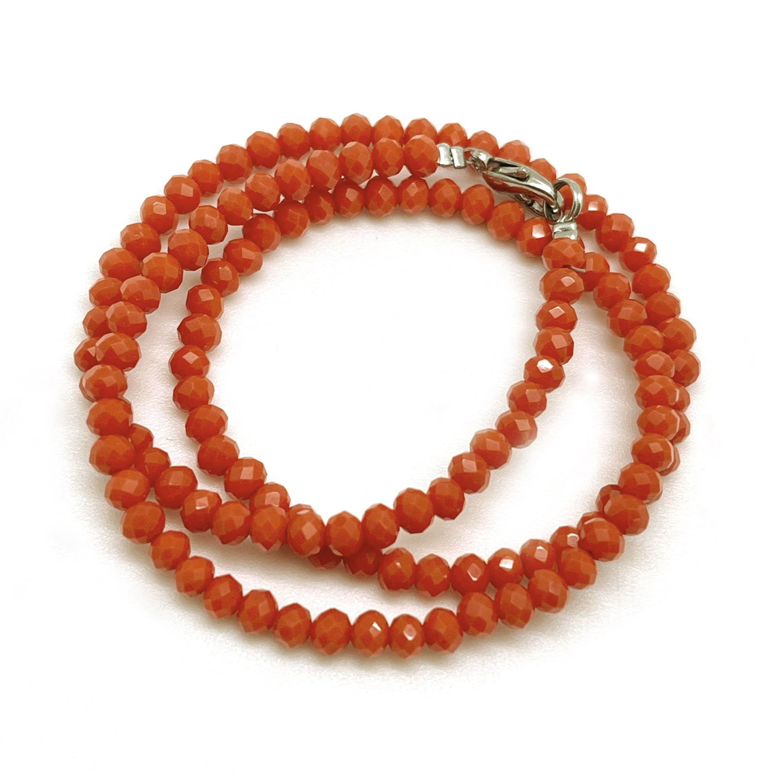 картинка NL68 Ожерелье из керамических бусин огранки рондаль цвет коралл от магазина El Corazon