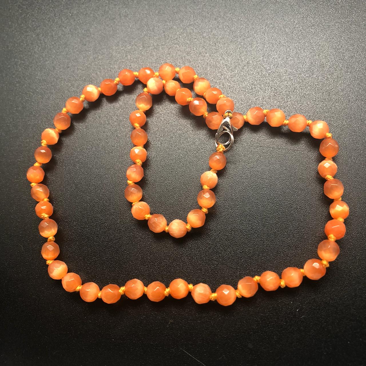 картинка Ожерелье 46 см из оранжевых граненных бусин Кошачьего глаза  от магазина El Corazon