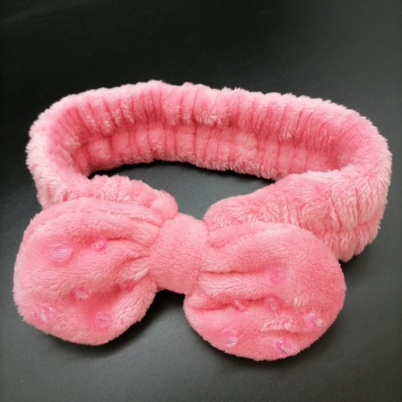картинка Мягкая повязка для волос с бантом на резинке, розовая  от магазина El Corazon