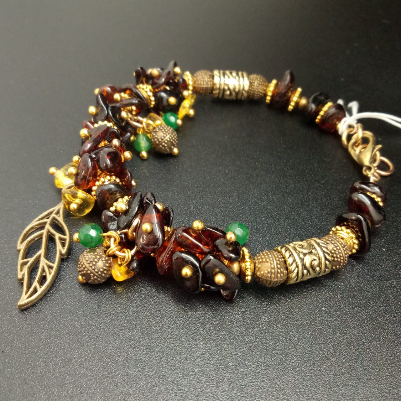 картинка Браслет из янтаря, ювелирного металла 03 bracelet-136 от магазина El Corazon